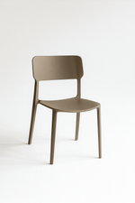 The Alex Chair in Driftwood — a minimalist, stackable dining chair with clean lines