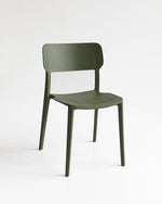 Alex Chair in Olive styled around a timber table – a practical and affordable seating option for real-life use