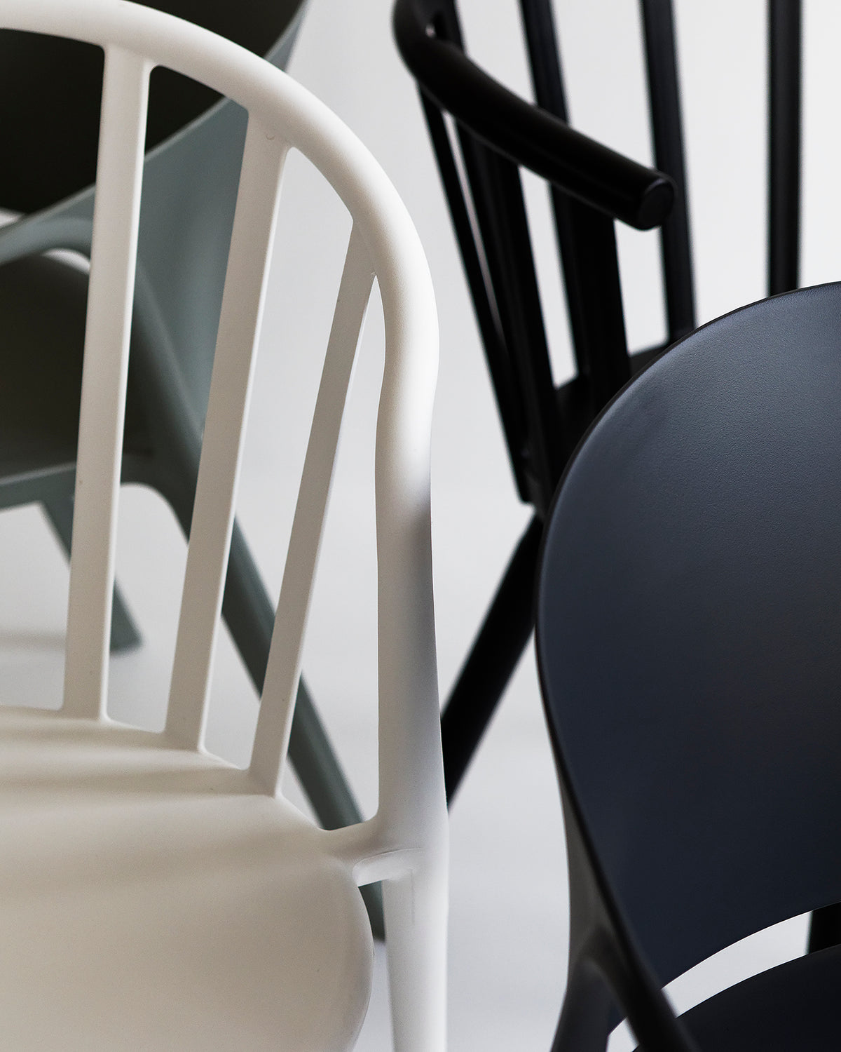 Group image showing the Cleo Chair alongside other Franka dining chairs, highlighting differences in shape, colour, and design details across the collection