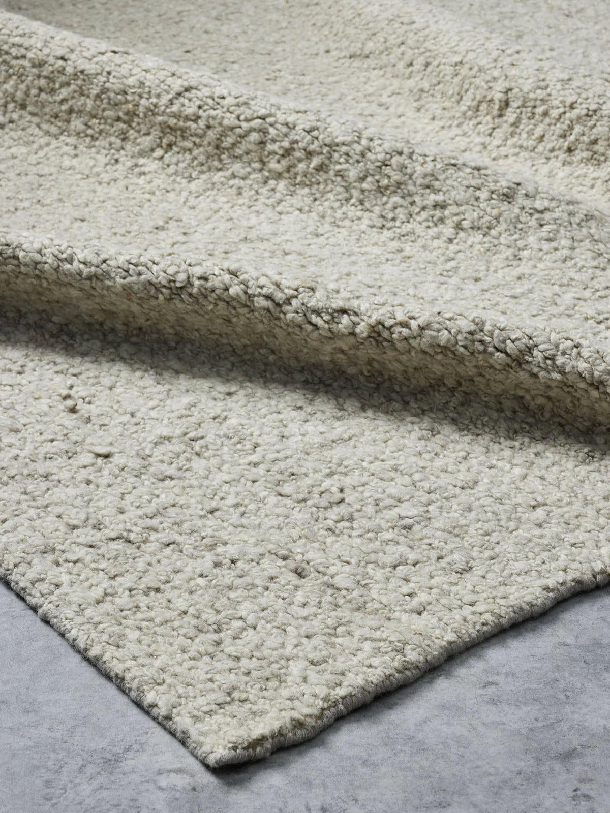 Tribe Home Roam Rug in Linen – handwoven rug in soft beige tones, perfect for brightening contemporary or minimalist spaces