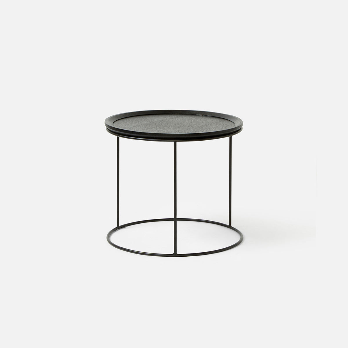 Close-up of the Freda Side Table in Black showing the deep-etched timber veneer top and smooth powder-coated edge