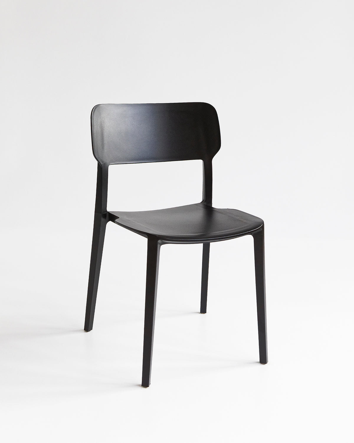 Durable Alex plastic dining chair with stackable design, ideal for any setting