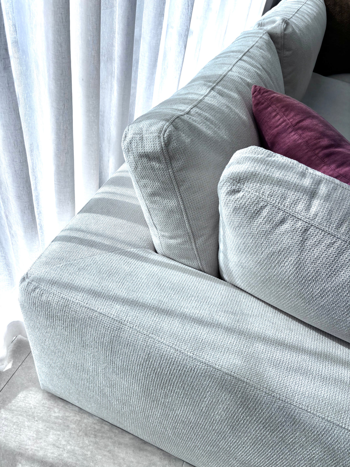 Close-up of Billie sofa feather-fibre cushions showing soft and supportive comfort