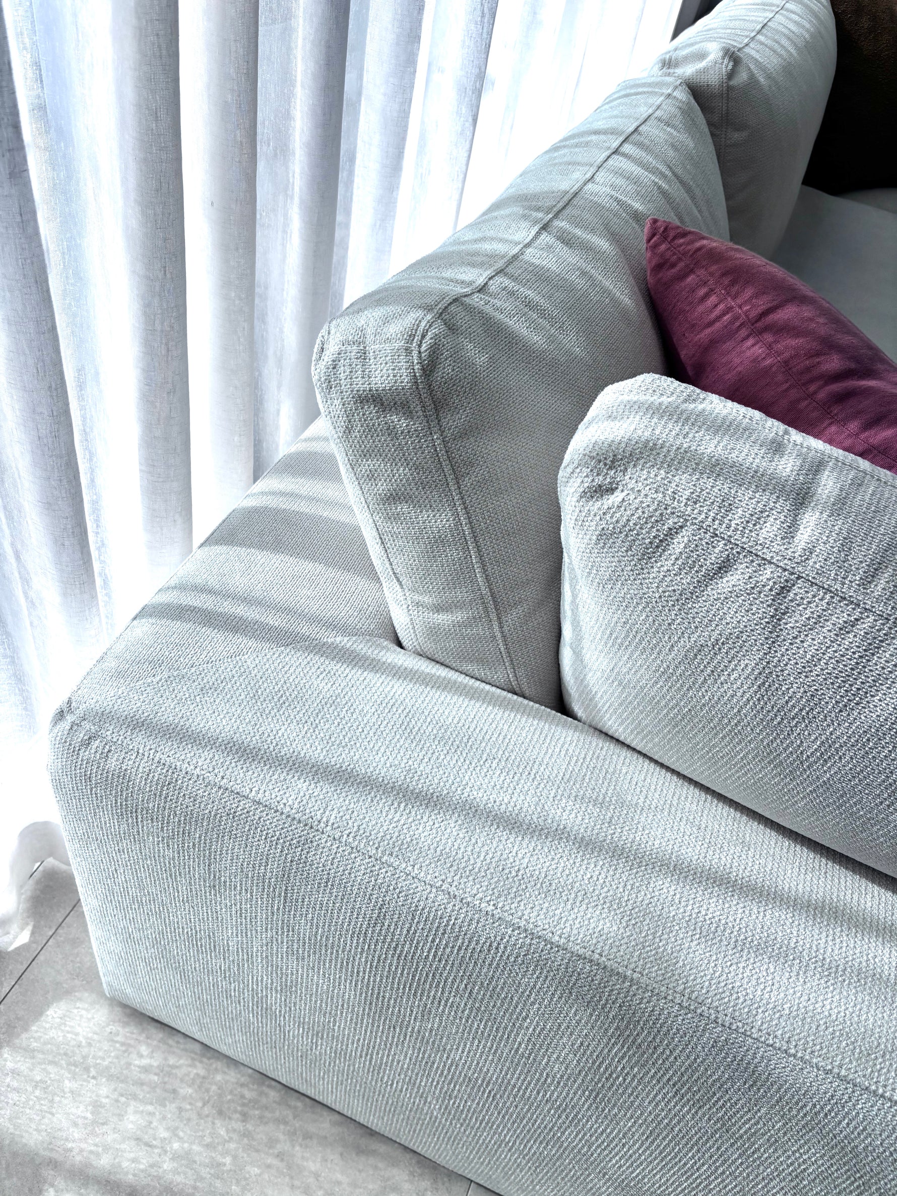 Close-up of Billie sofa feather-fibre cushions showing soft and supportive comfort