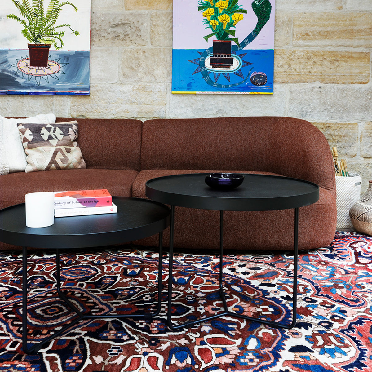 Calvin Sofa in Rove brick styled with cushions in a living room