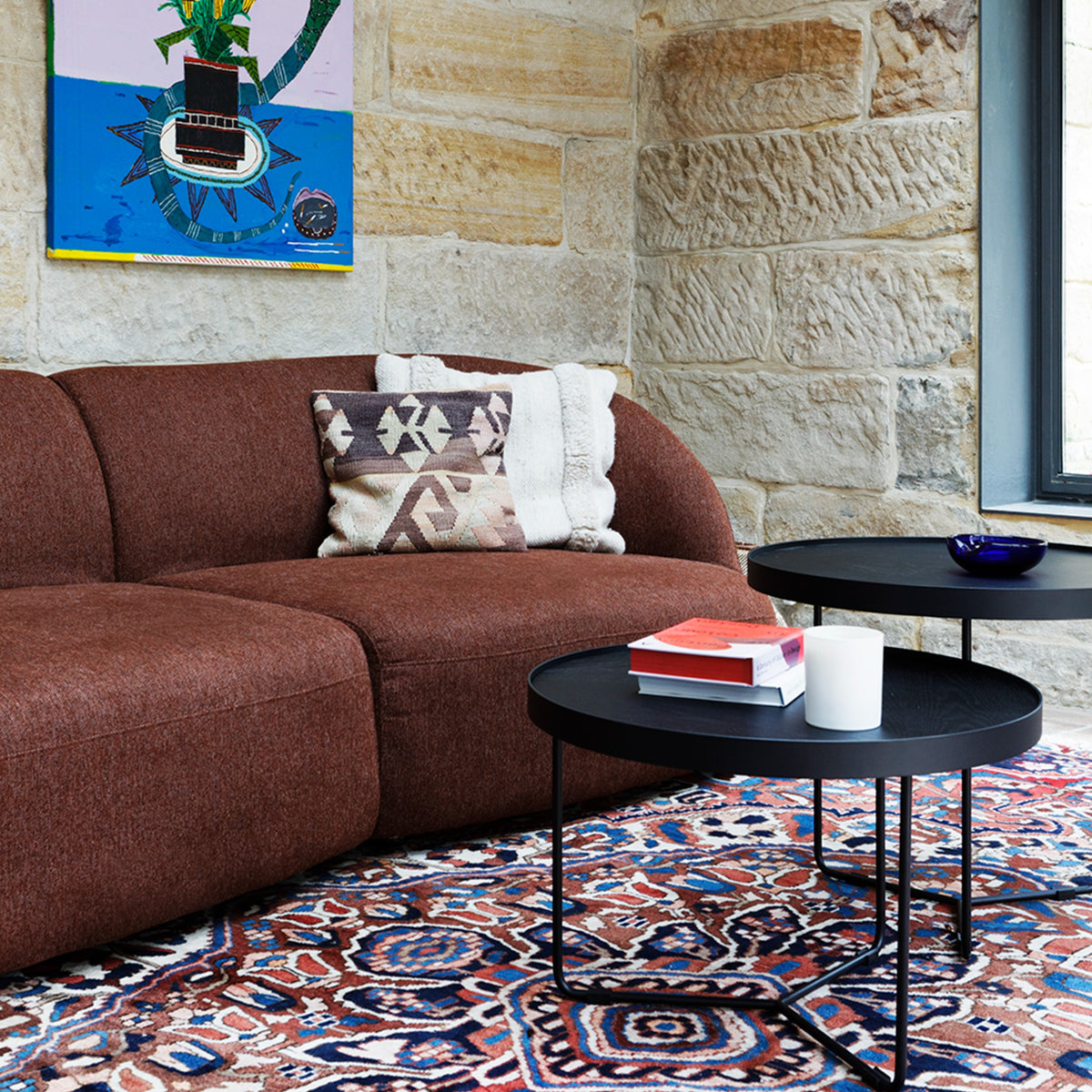 Calvin Sofa in Rove brick shown in a styled interior
