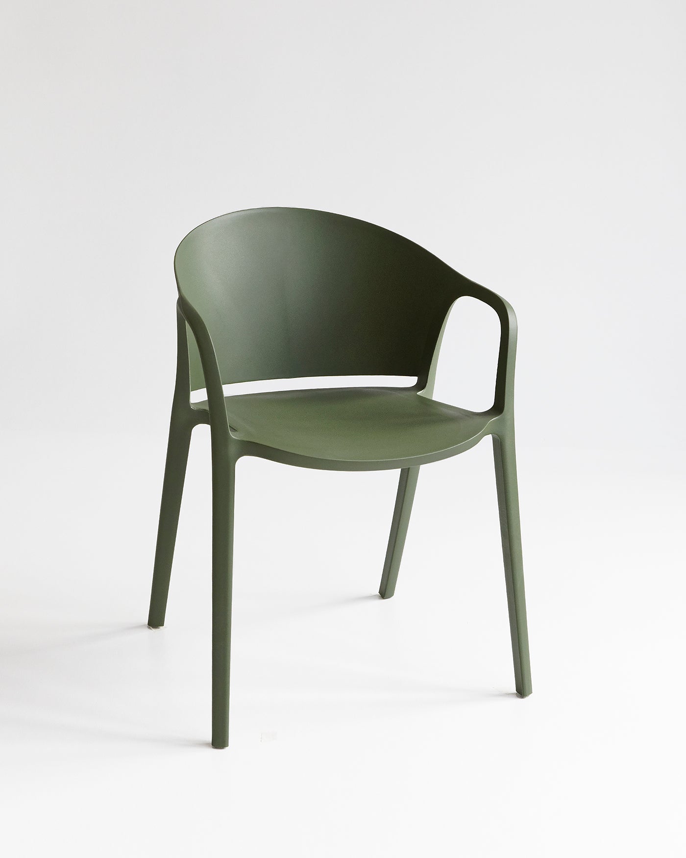 Front view of the Carla Armchair in Olive, a modern stackable polypropylene dining chair for indoor or outdoor use