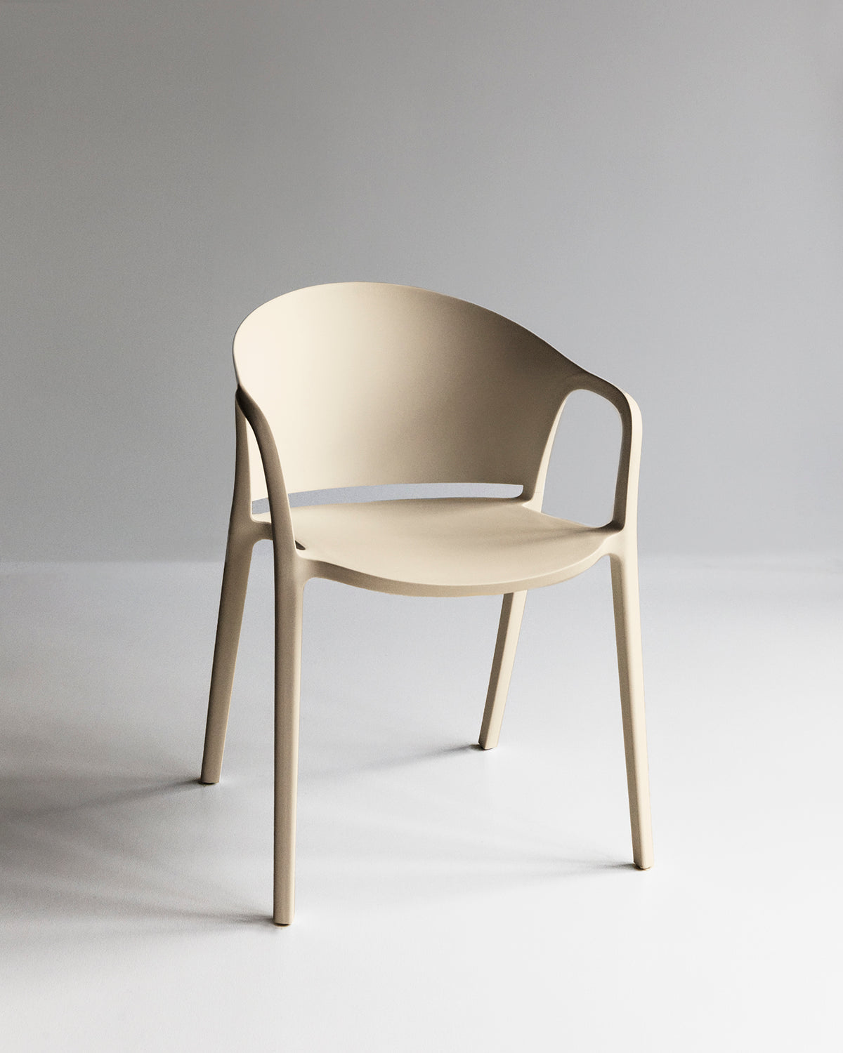 Carla Chair in Beige shown from the front in a neutral studio setting.