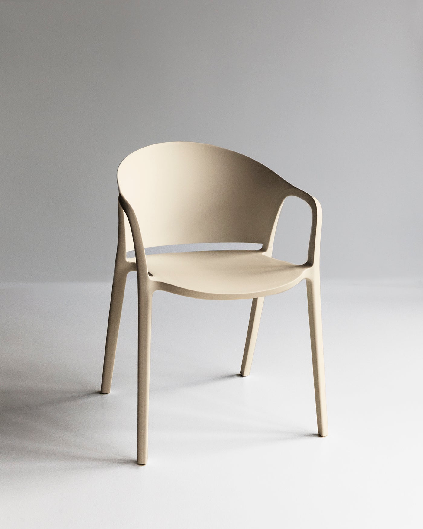 Carla Chair in Beige shown from the front in a neutral studio setting.