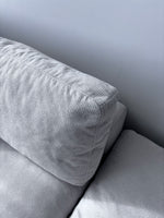 Close-up of Billie comfortable couch showing armrest and fine stitching finish