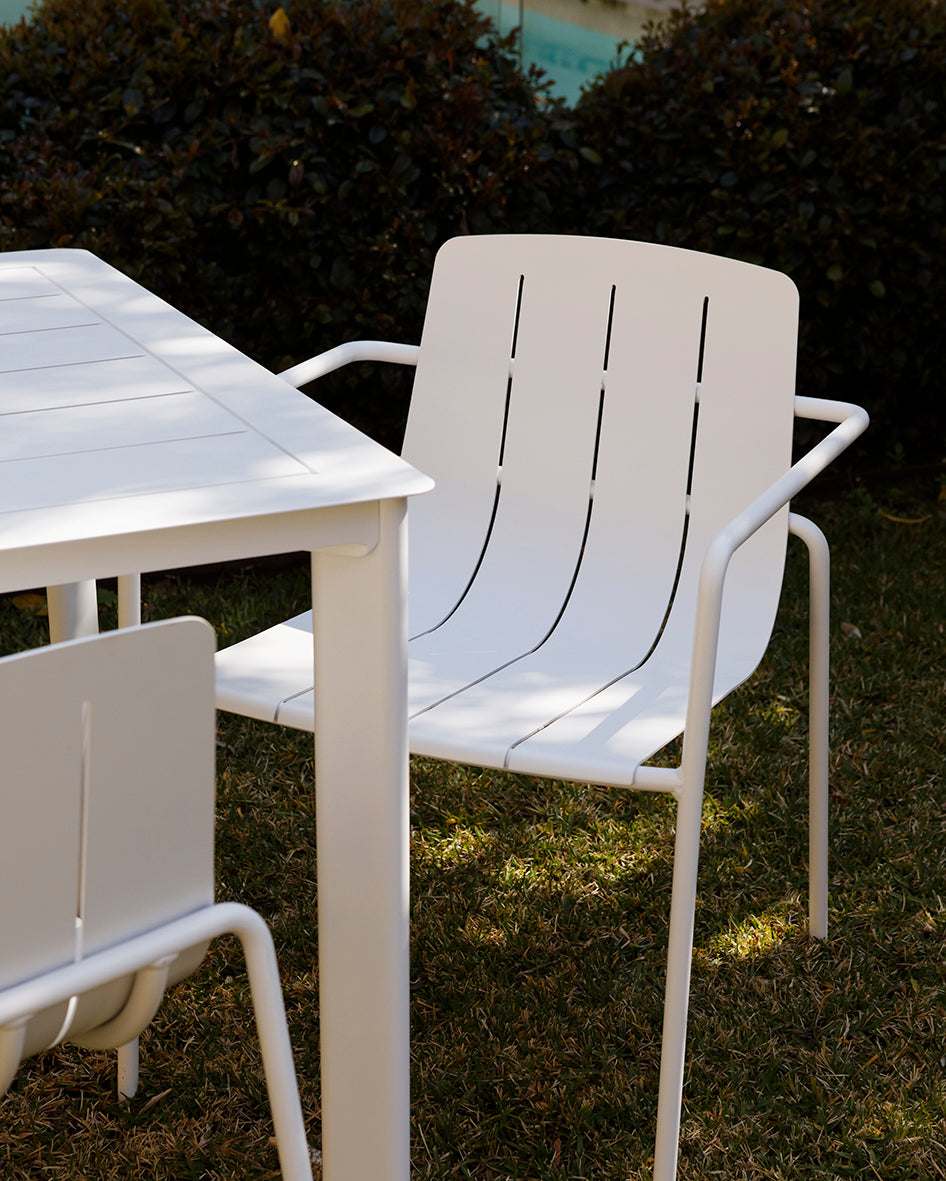 Remy Outdoor Dining Armchair in crisp white finish, perfect for alfresco dining. 