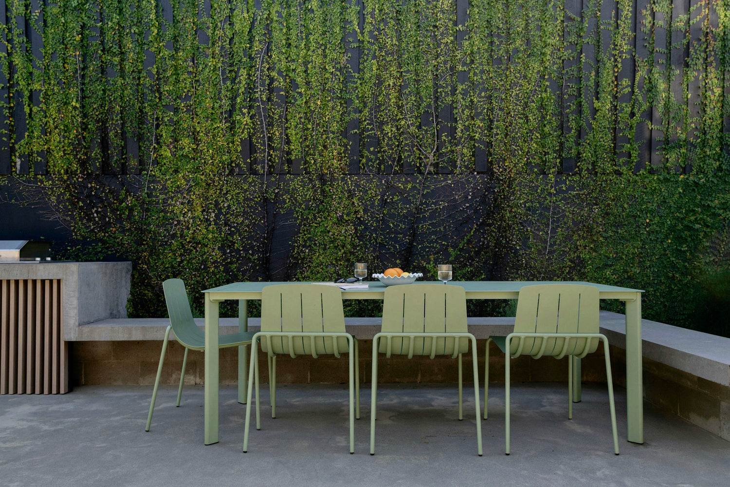 Eucalypt outdoor dining table and matching Remy chairs arranged for stylish outdoor dining