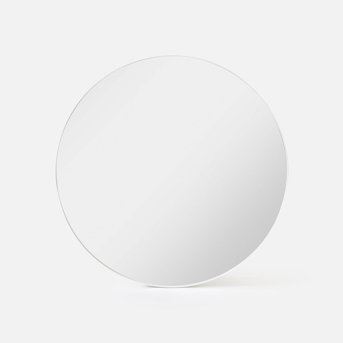Bobbi Round Mirror in white shown front-on, a one-metre circular wall mirror