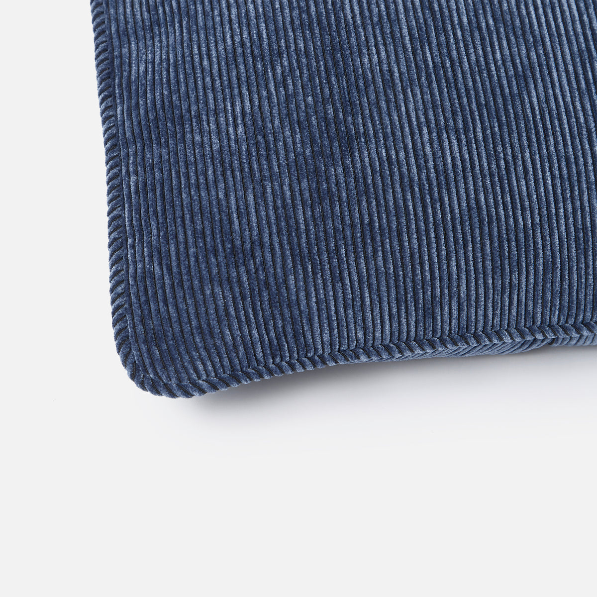 Close-up of the Bowie cushion in denim, showing the fabric texture