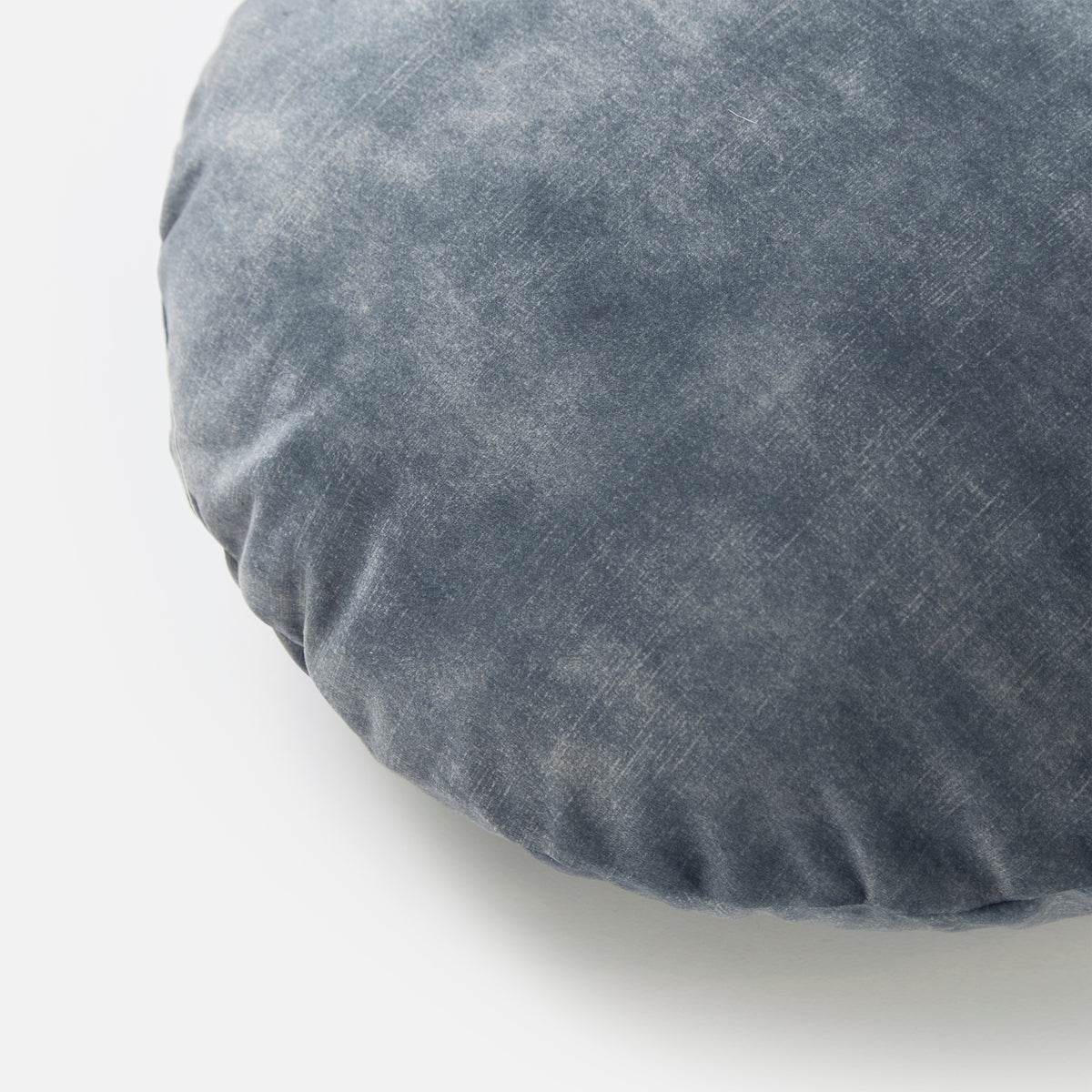 Close-up of the Electra Round Cushion in aqua velvet, showing the pile