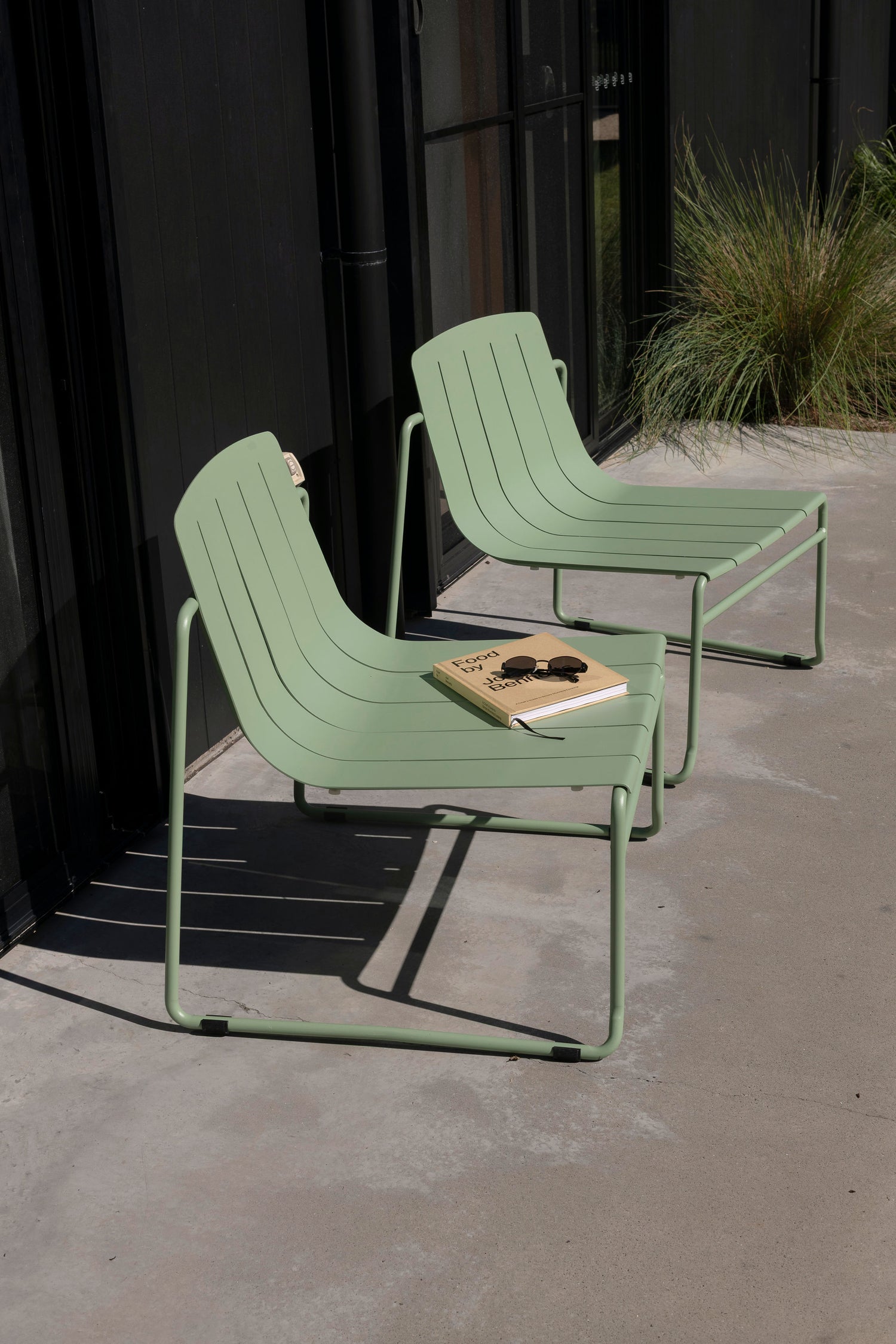 Comfortable outdoor lounge chair in eucalypt with sculptural frame design