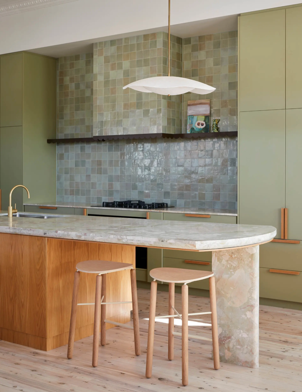 Oak Greta kitchen stool styled in a modern home interior, positioned at a kitchen counter with warm timber finishes and neutral styling