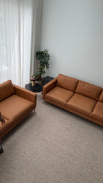 2 + 3 seat sofas sitting together in living room 