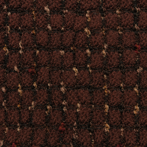 Marlo fabric in Oxide, a close-up of the chunky boucle weave in deep rust, used on Rocco and Roy