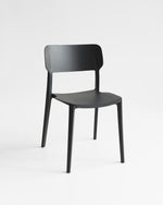 Durable Alex plastic dining chair with stackable design, ideal for any setting