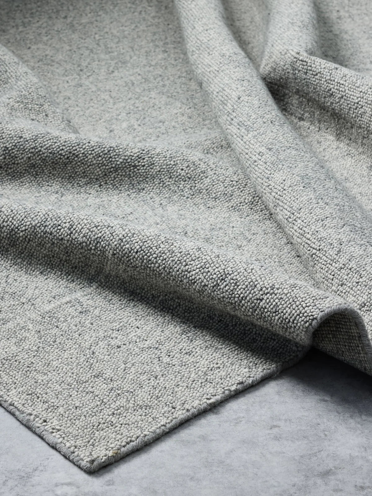 Tribe Home Nobel Rug in Blue Grey – handwoven wool rug with soft, tonal variation in a calming blue-grey colourway.
