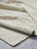 Parker Wool Rug by Tribe Home – handwoven 100% wool rug in soft beige tones, perfect for creating a calm, grounded interior.