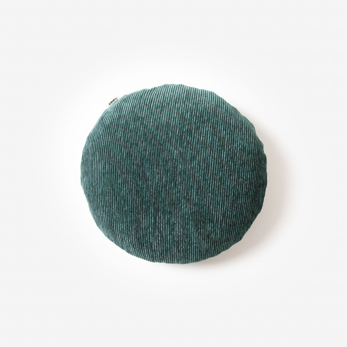 Bowie round cushion in petrol blue corduroy, soft and textured