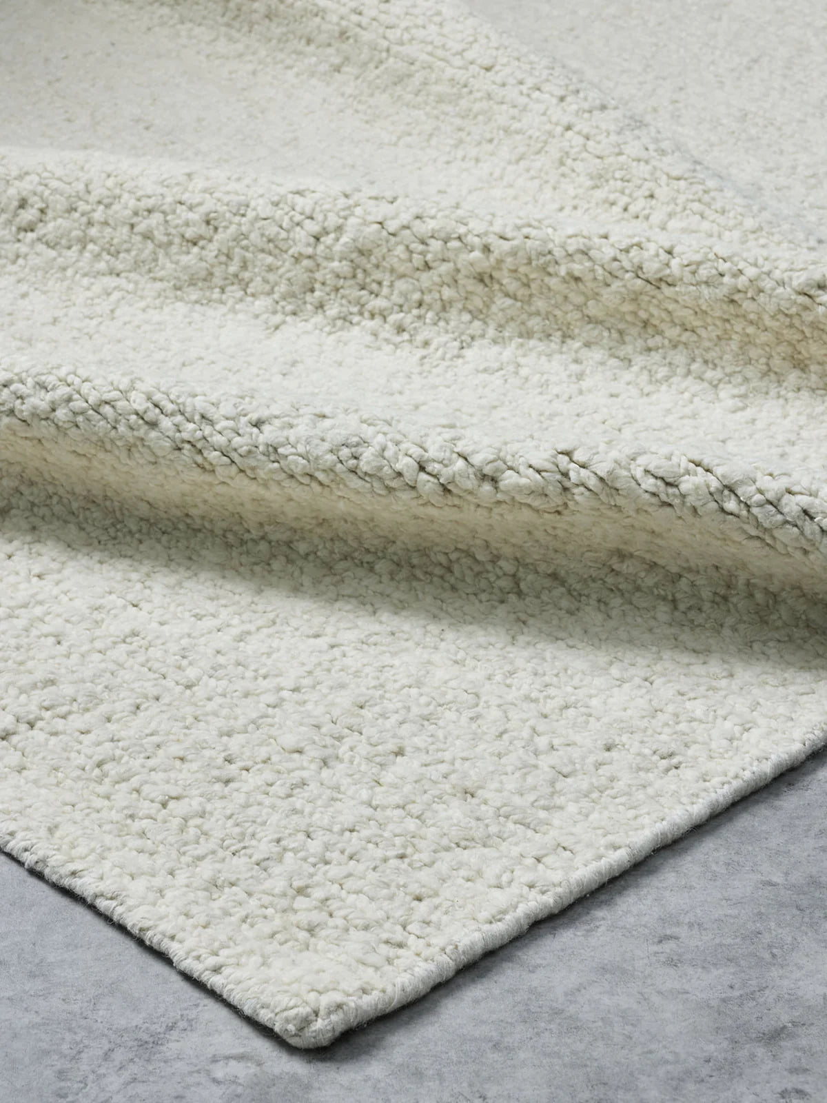 Franka’s Roam Rug in Coconut – light-toned, artisan-made rug in a warm ivory shade, ideal for layering in modern homes