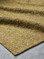 Roam Rug by Tribe Home in Crocodile – rich olive-toned wool blend rug with textured weave, perfect for earthy, grounded interiors.