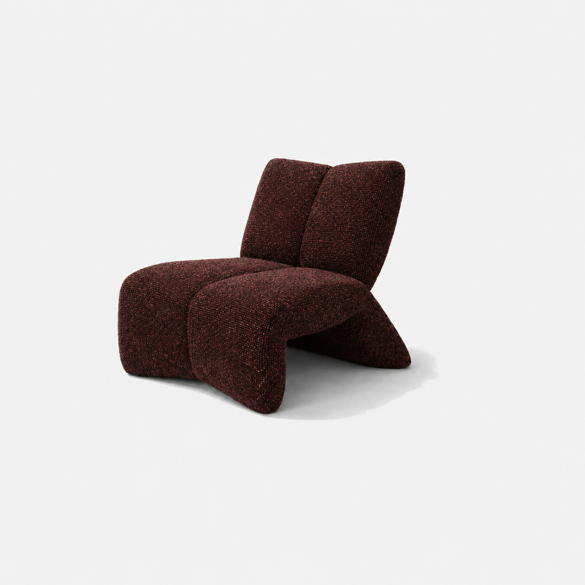 Rocco Chair in Marlo Oxide, an oversized low-profile armchair in deep rust