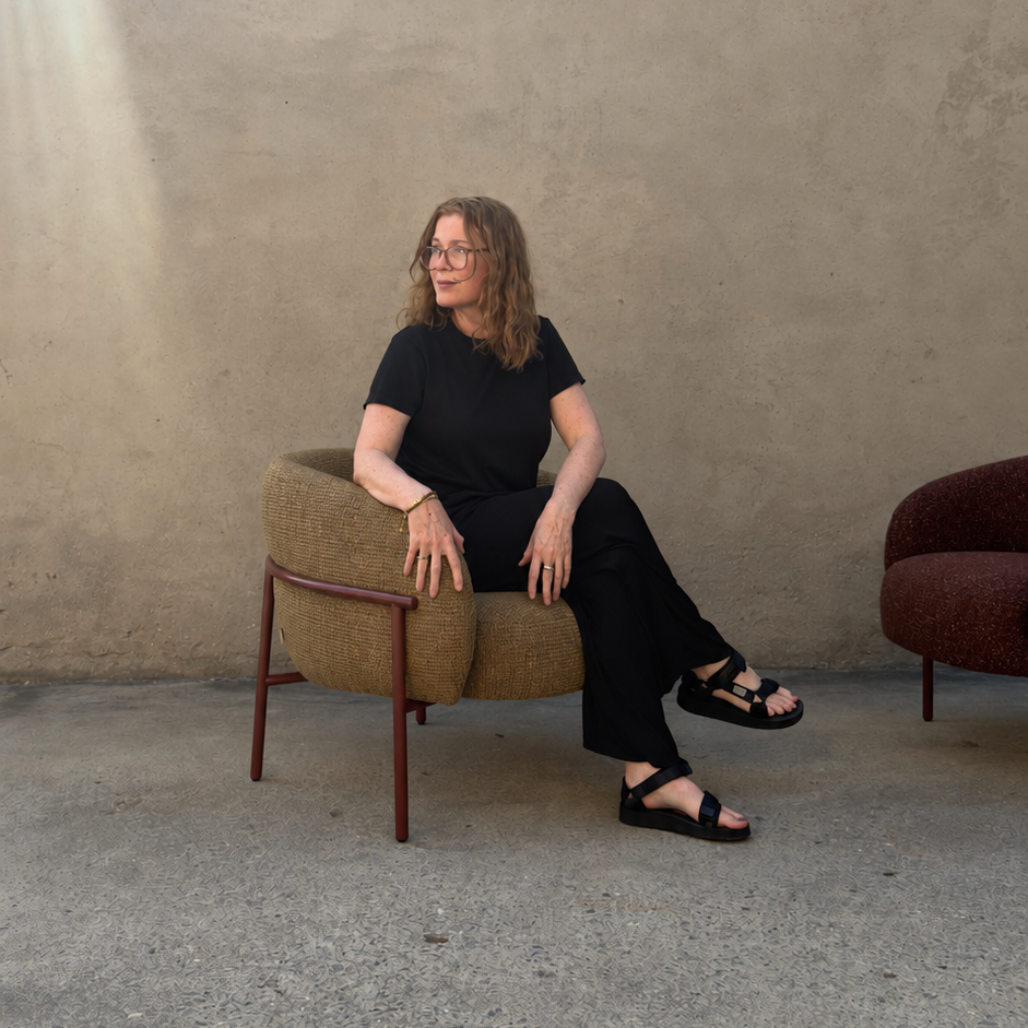 Person sitting on Roy Chair
