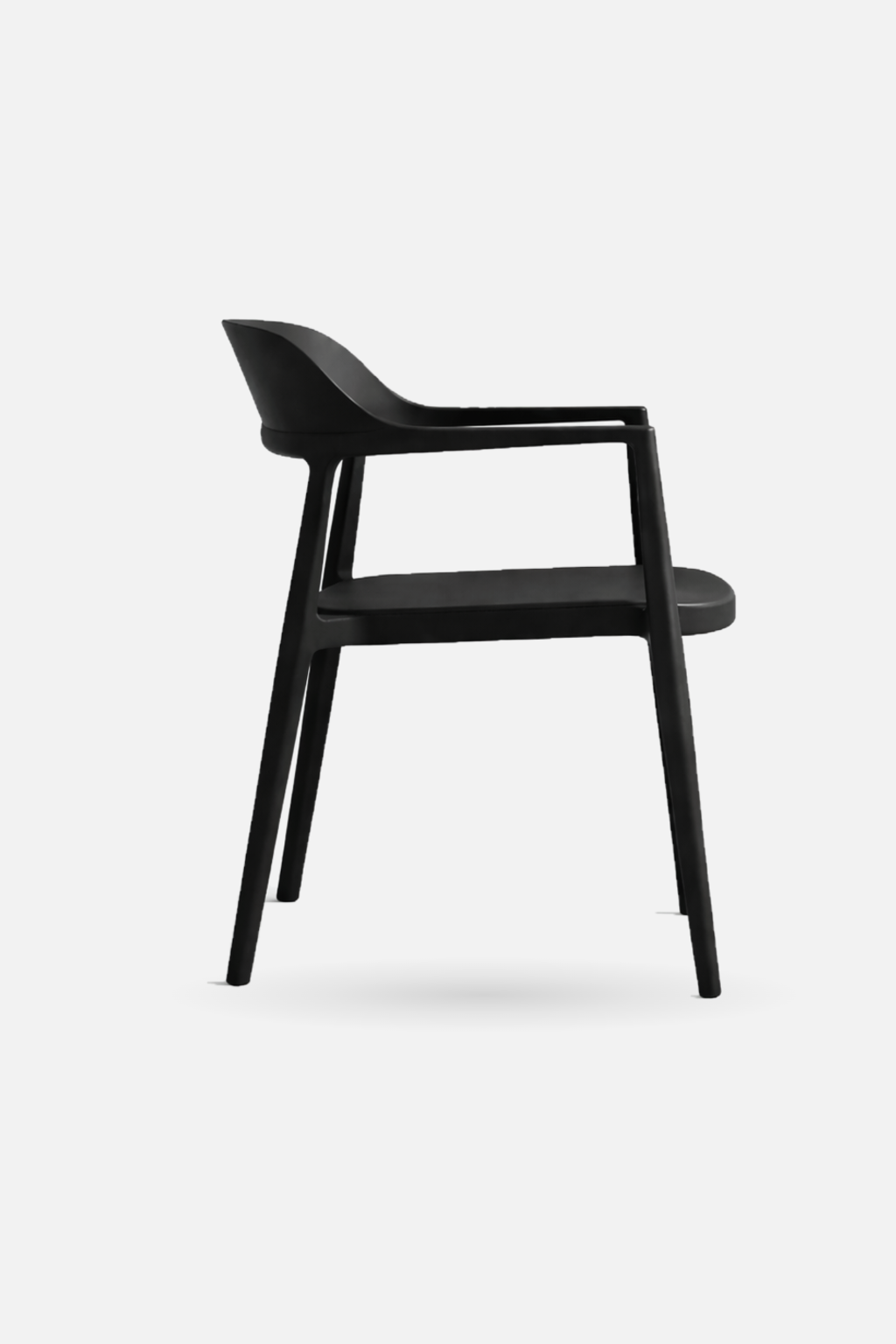 Arlo Chair in black shown from the side, a stackable dining chair