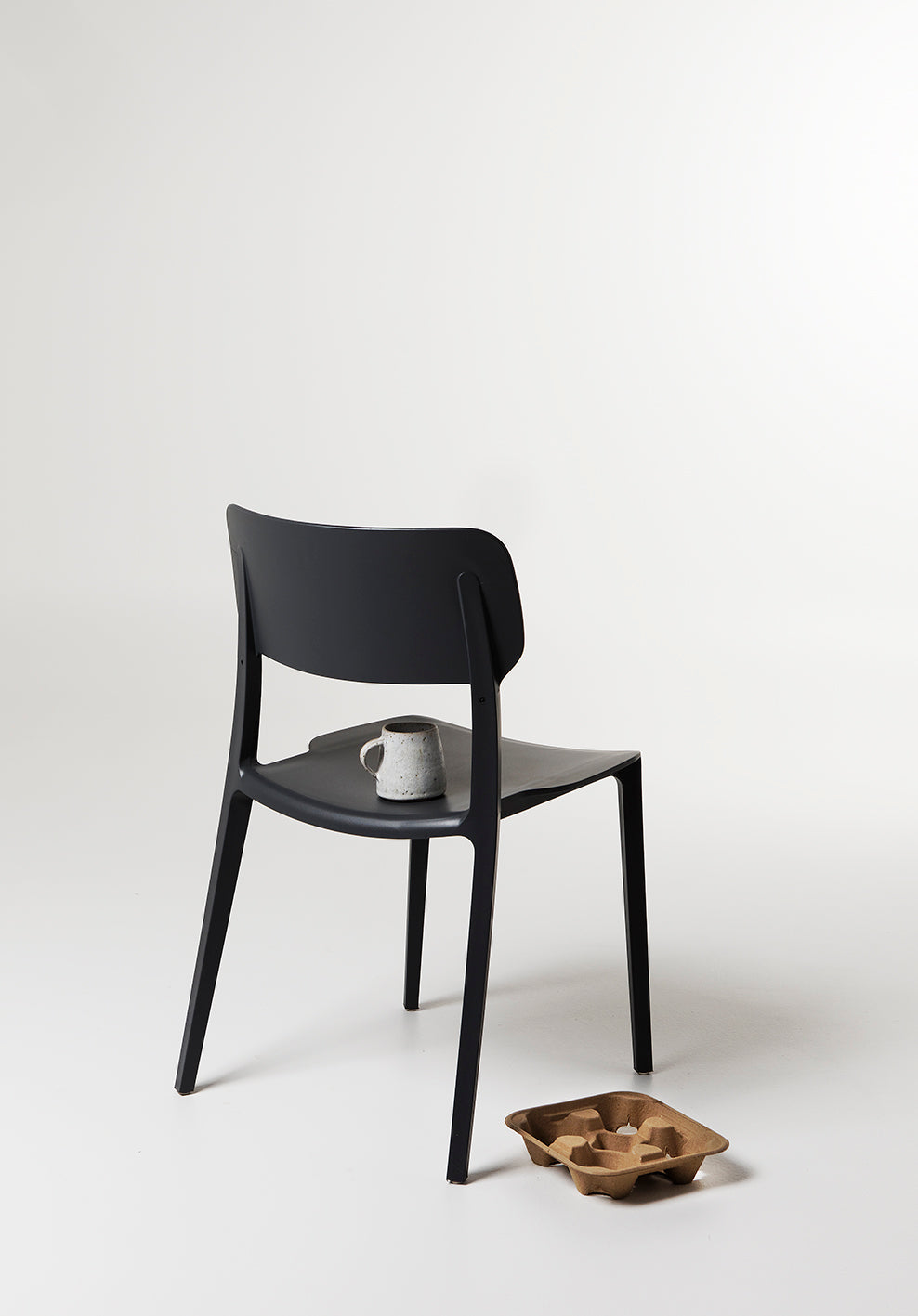 Close-up of the Black Alex Chair – functional, affordable design with a clean profile and all-weather finish.