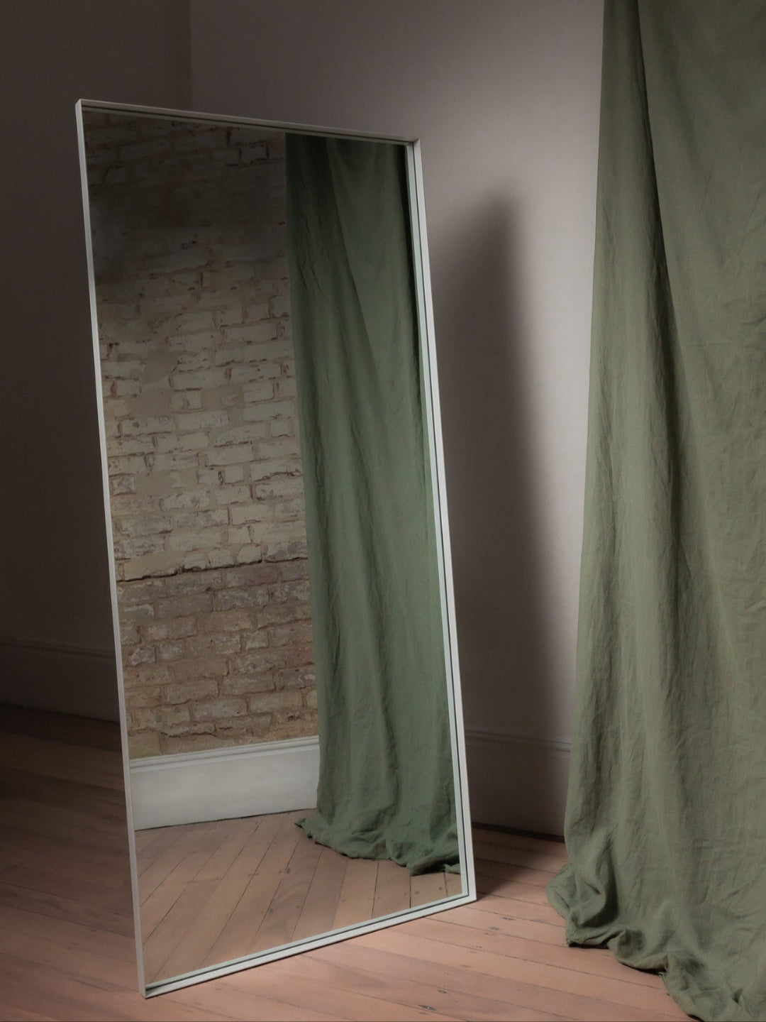 White Luca Mirror in a soft-toned bedroom, used as a full body mirror
