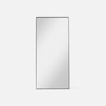 Black Luca Mirror in studio setting – slim full length mirror with clean rectangular frame